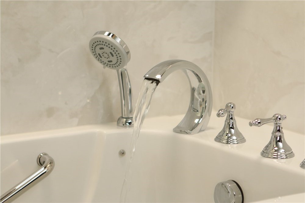 Walk in tub faucet and grab bar detail