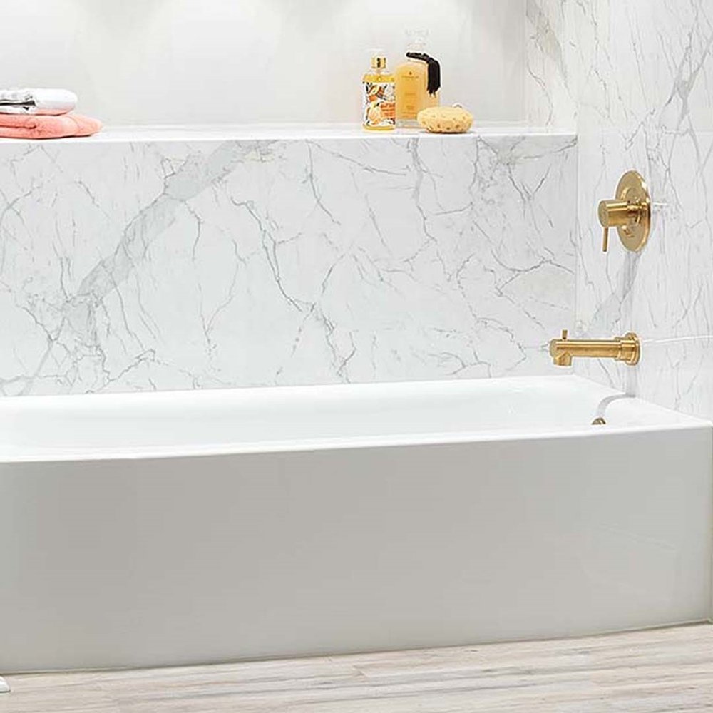 Bathtub replacement with a marble look surround